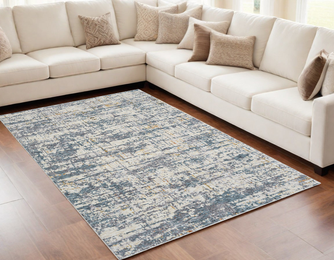 5' X 8' Blue and Ivory Abstract Area Rug