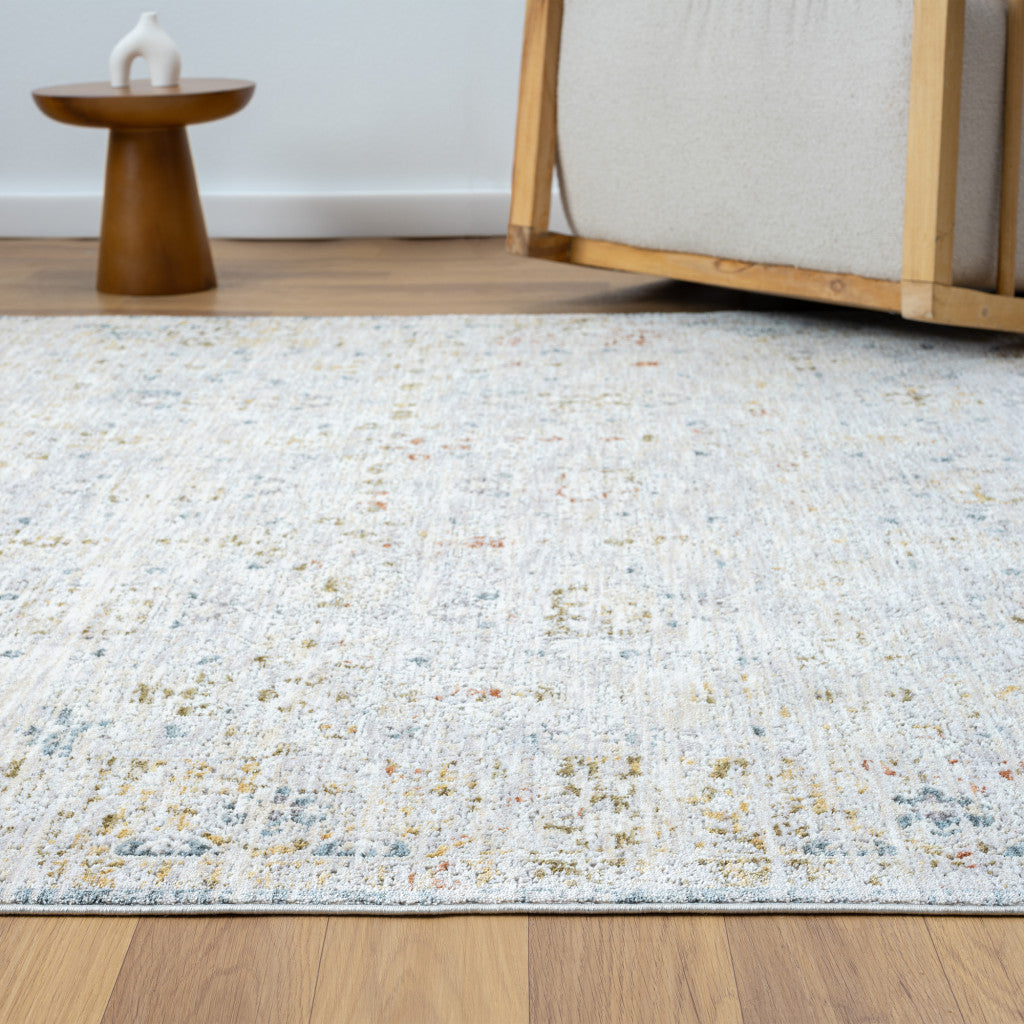 5' X 8' Ivory and Blue Floral Area Rug