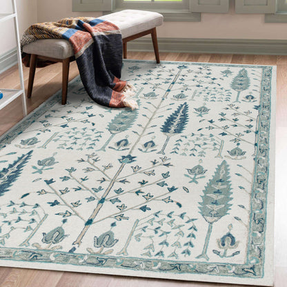 9' X 12' Ivory and Blue Wool Floral Hand Tufted Area Rug