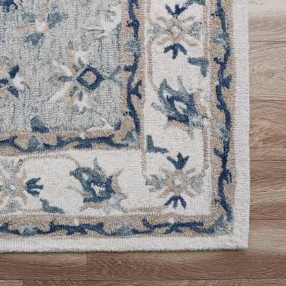 5' X 8' Blue and Ivory Wool Floral Hand Tufted Area Rug