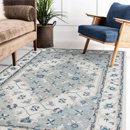 5' X 8' Blue and Ivory Wool Floral Hand Tufted Area Rug