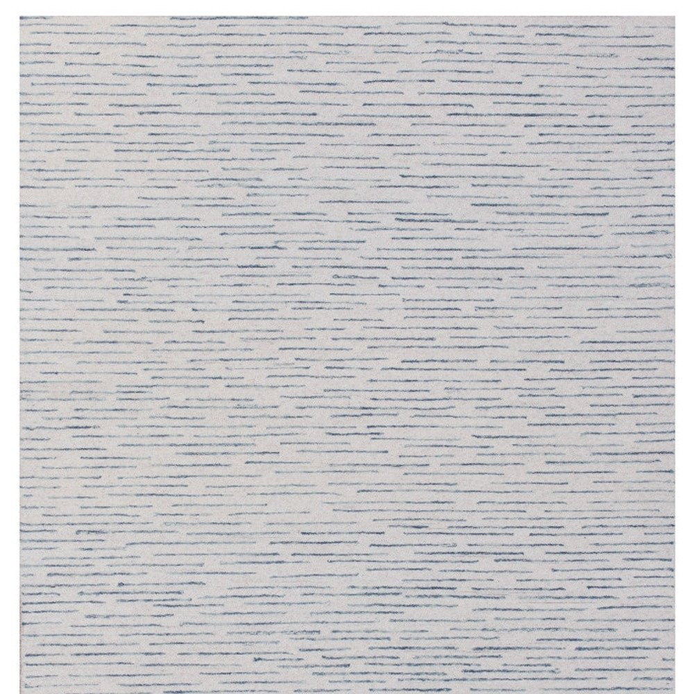 5' X 8' Ivory and Blue Wool Striped Hand Tufted Area Rug