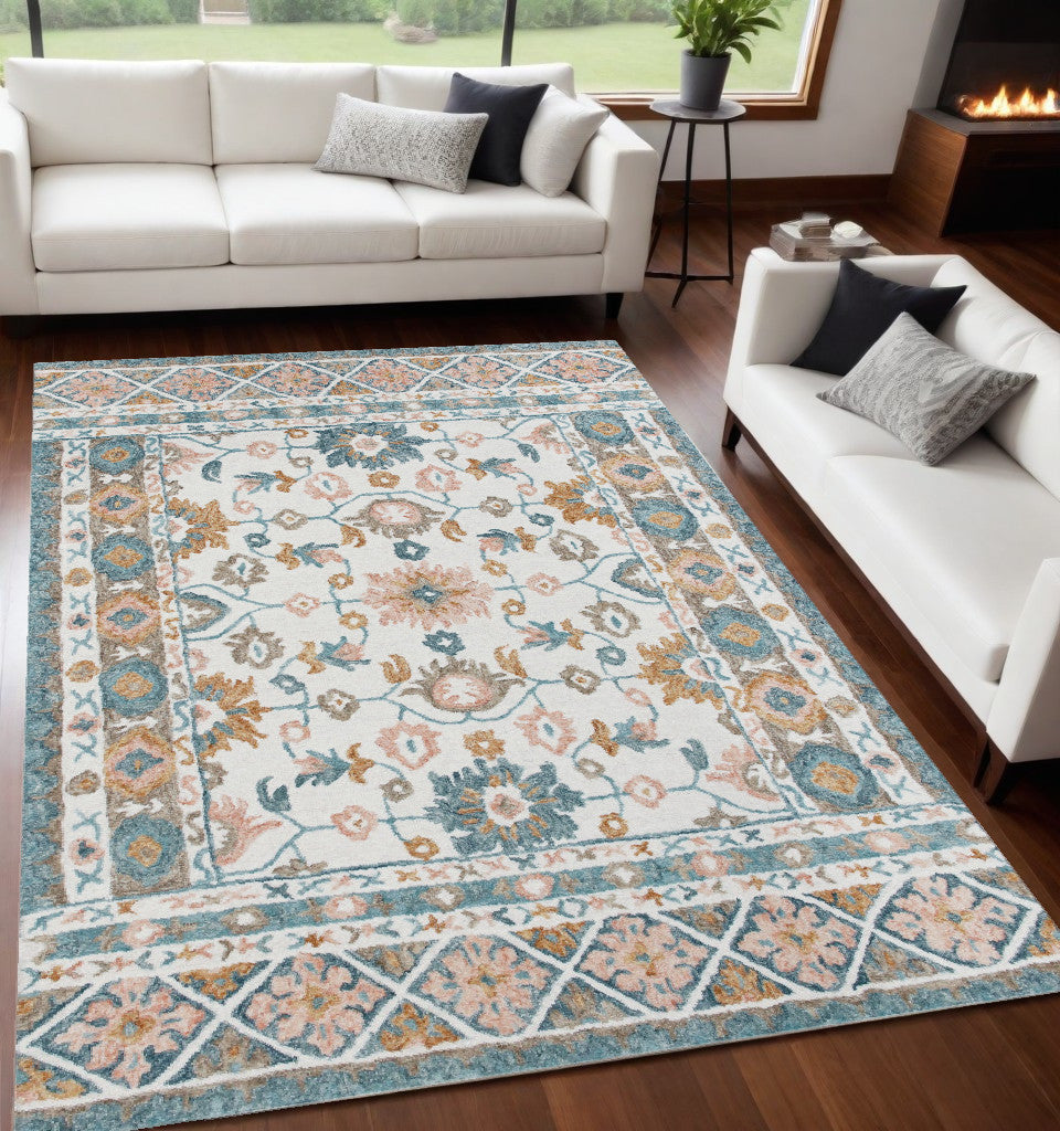 9' X 12' Blue and Ivory Wool Floral Hand Tufted Area Rug