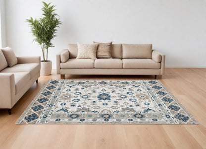 9' X 12' Blue and Ivory Wool Floral Hand Tufted Area Rug