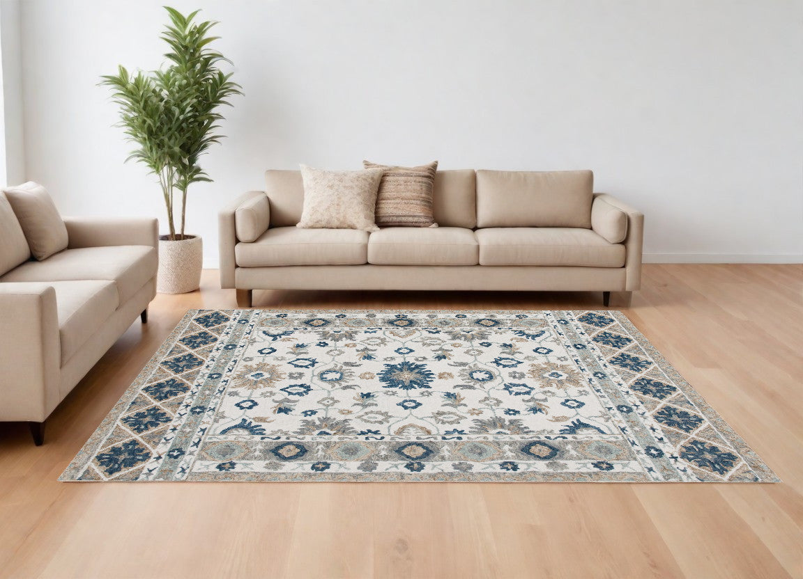 9' X 12' Blue and Ivory Wool Floral Hand Tufted Area Rug