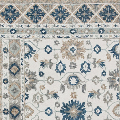 9' X 12' Blue and Ivory Wool Floral Hand Tufted Area Rug