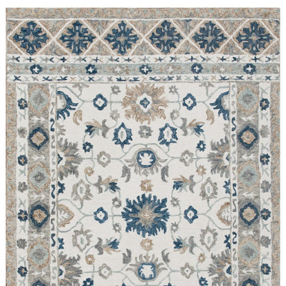 9' X 12' Blue and Ivory Wool Floral Hand Tufted Area Rug