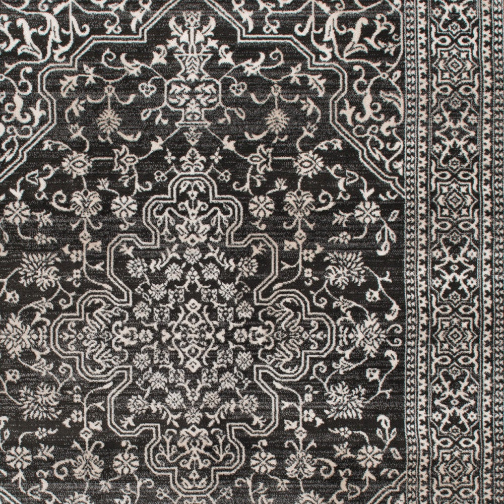 5' X 8' Black and Ivory Oriental Distressed Area Rug