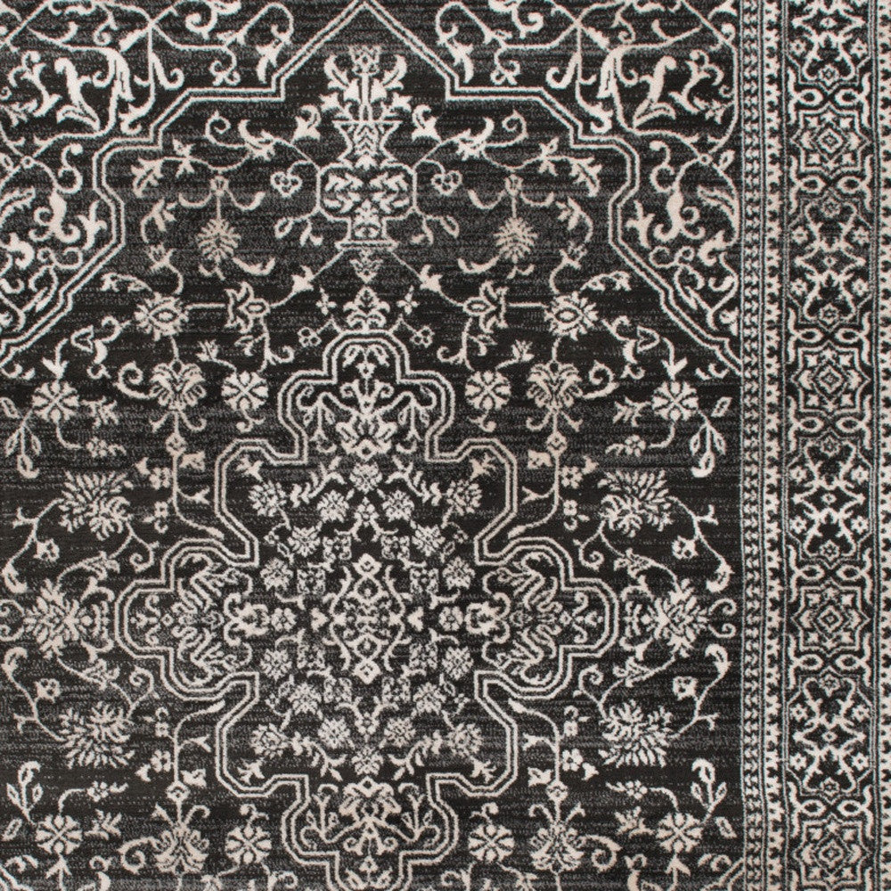 5' X 8' Black and Ivory Oriental Distressed Area Rug