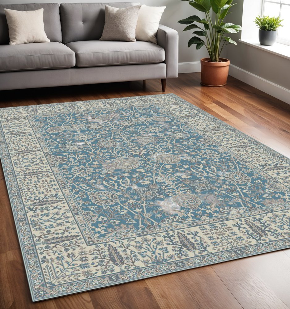5' X 8' Blue and Ivory Oriental Area Rug