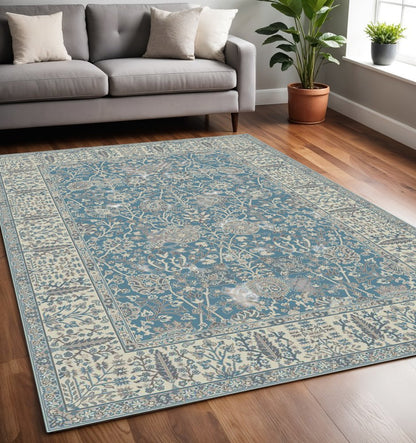 5' X 8' Blue and Ivory Oriental Area Rug