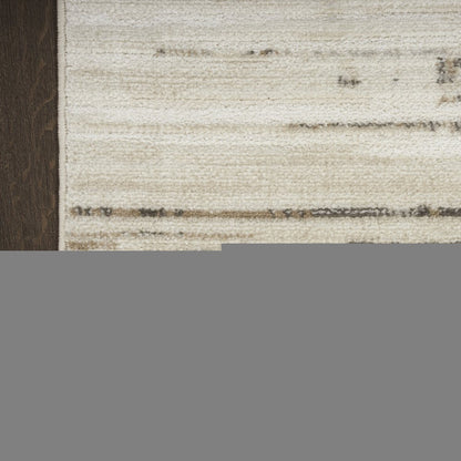 5' X 7' Cream Abstract Distressed Area Rug