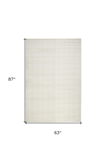 5' X 7' Cream Geometric Area Rug