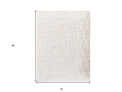 2' X 3' White and Gold Faux Fur Abstract Shag Non Skid Area Rug