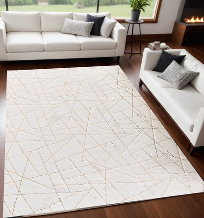 2' X 3' White and Gold Faux Fur Abstract Shag Non Skid Area Rug