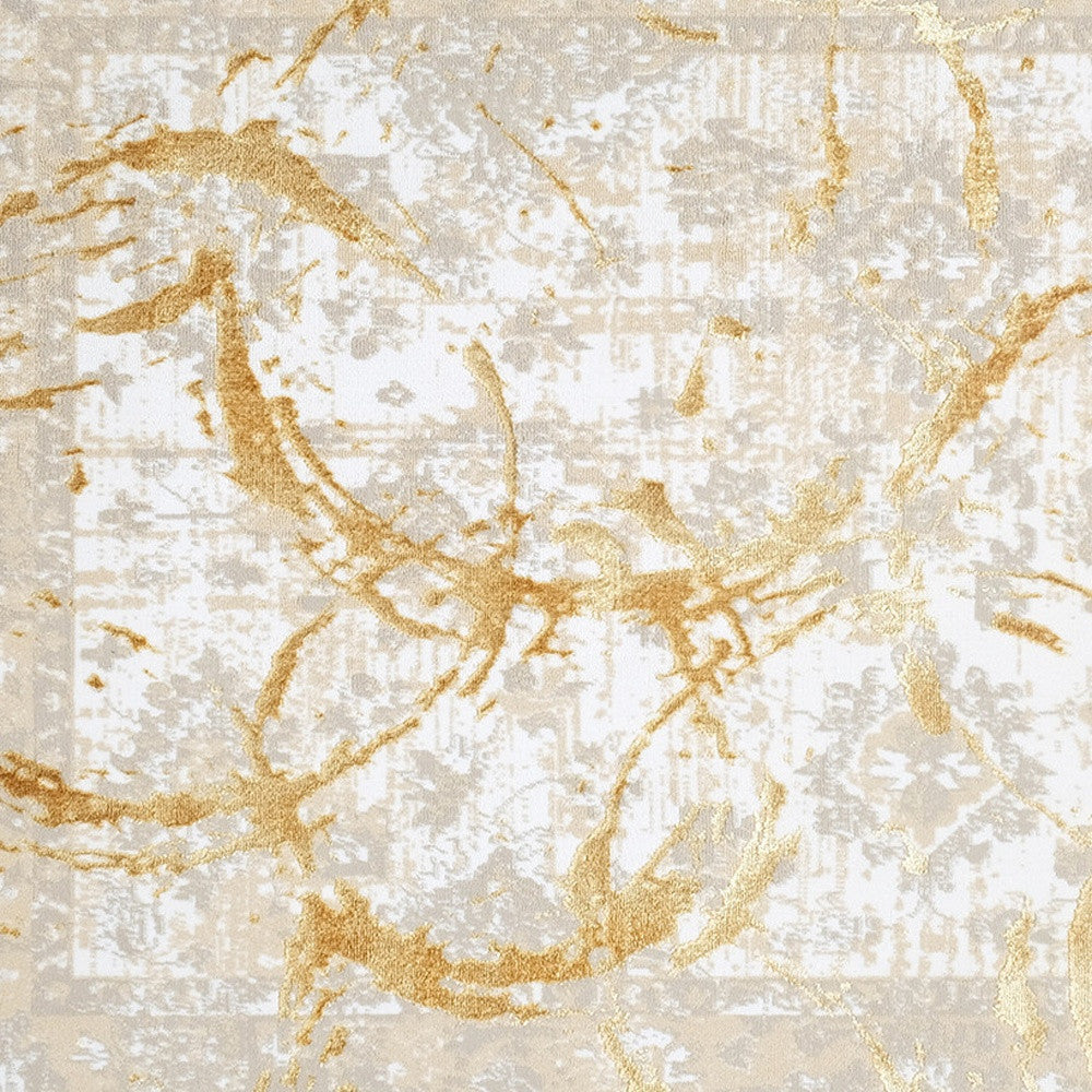 3' X 5' Beige and Gold Abstract Area Rug