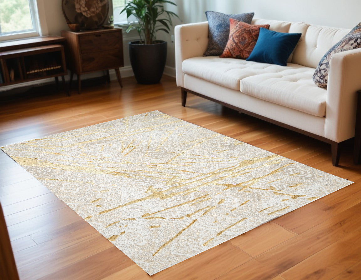 9' X 12' Ivory and Gold Abstract Area Rug