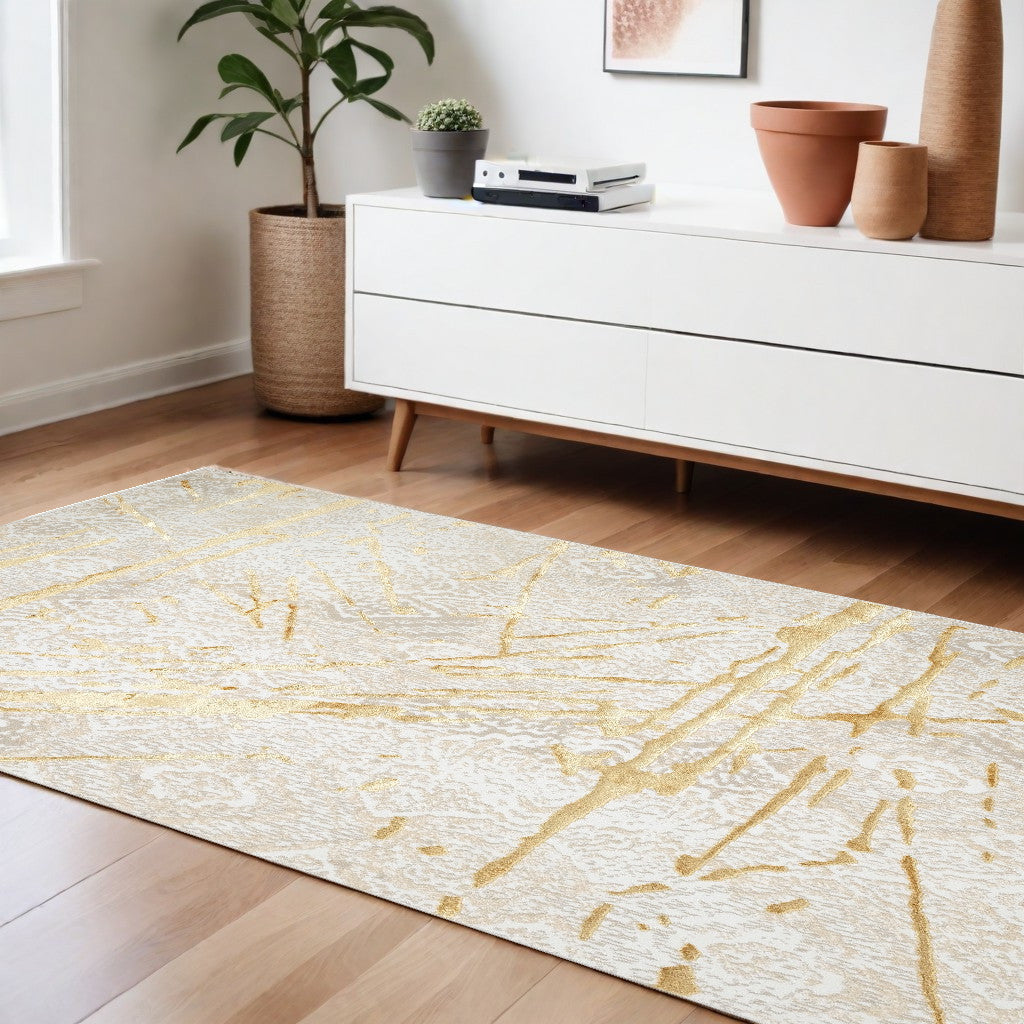 9' X 12' Ivory and Gold Abstract Area Rug