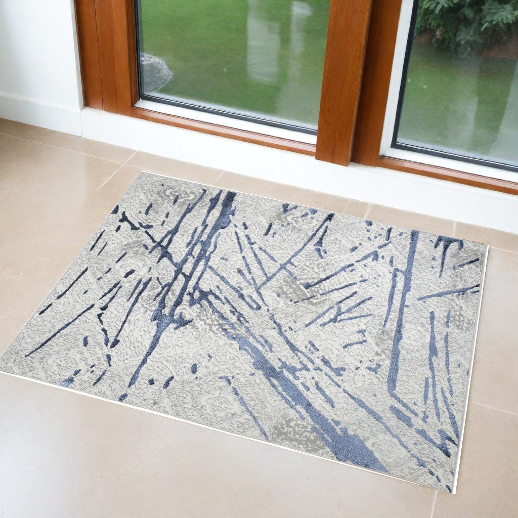 3' X 5' Ivory and Blue Abstract Area Rug