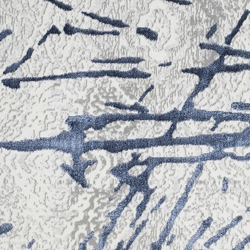 3' X 5' Ivory and Blue Abstract Area Rug