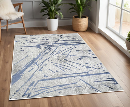 3' X 5' Ivory and Blue Abstract Area Rug