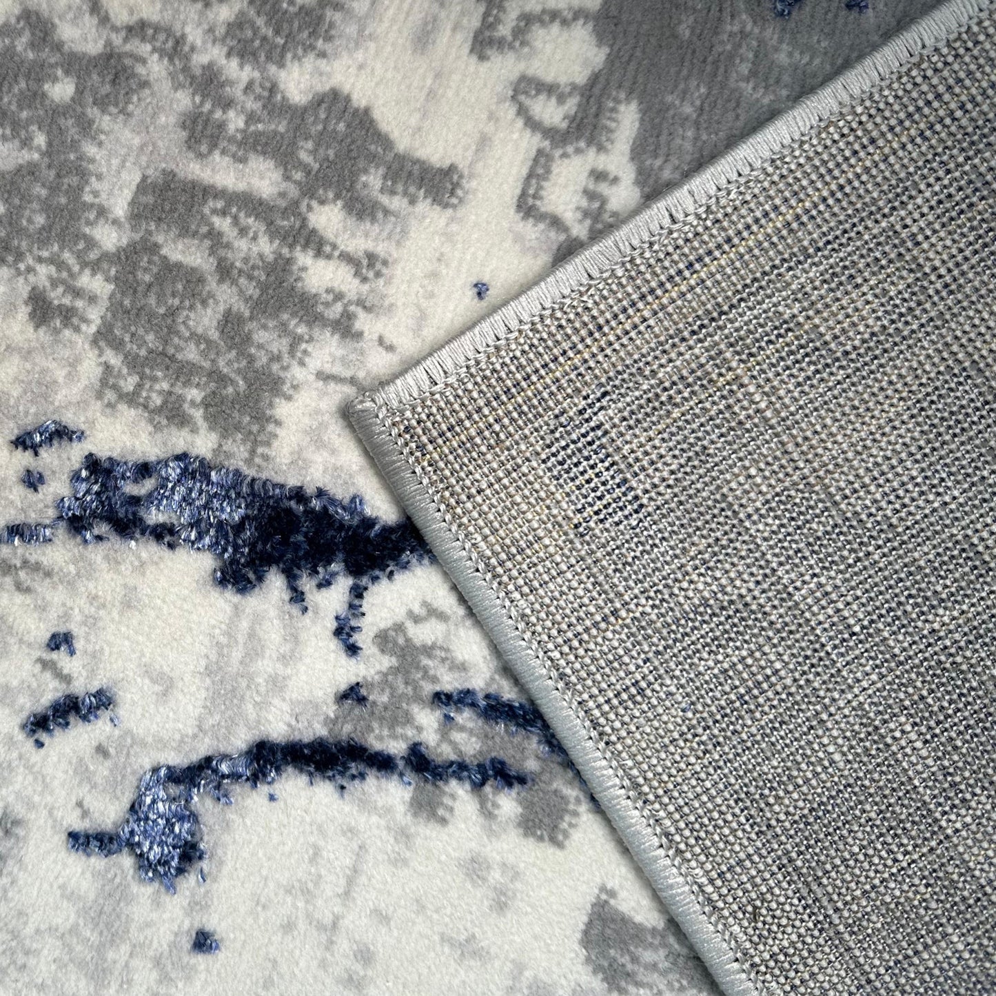 3' X 5' Ivory and Blue Abstract Area Rug