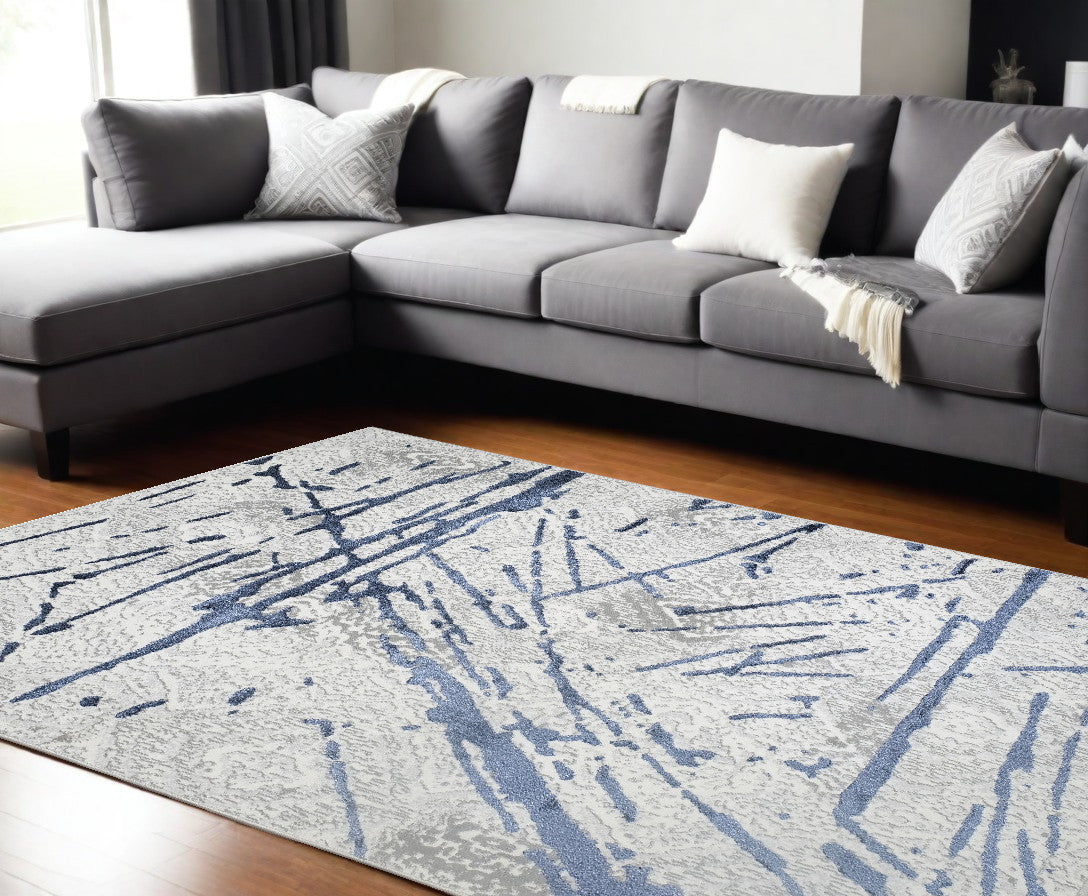 3' X 5' Ivory and Blue Abstract Area Rug