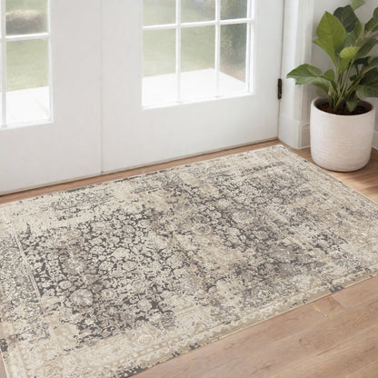 2' X 3' Gray and Ivory Floral Area Rug