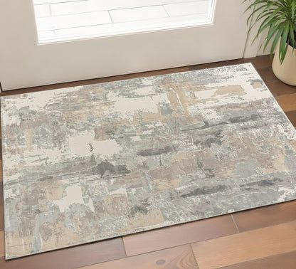 2' X 3' Beige Ivory And Gray Abstract Area Rug