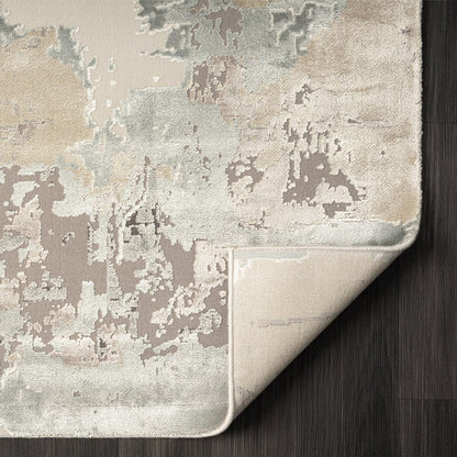 2' X 3' Beige Ivory And Gray Abstract Area Rug