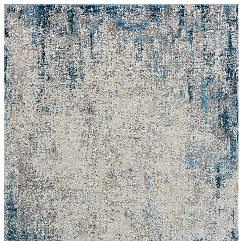 2' X 3' Blue and Ivory Abstract Area Rug