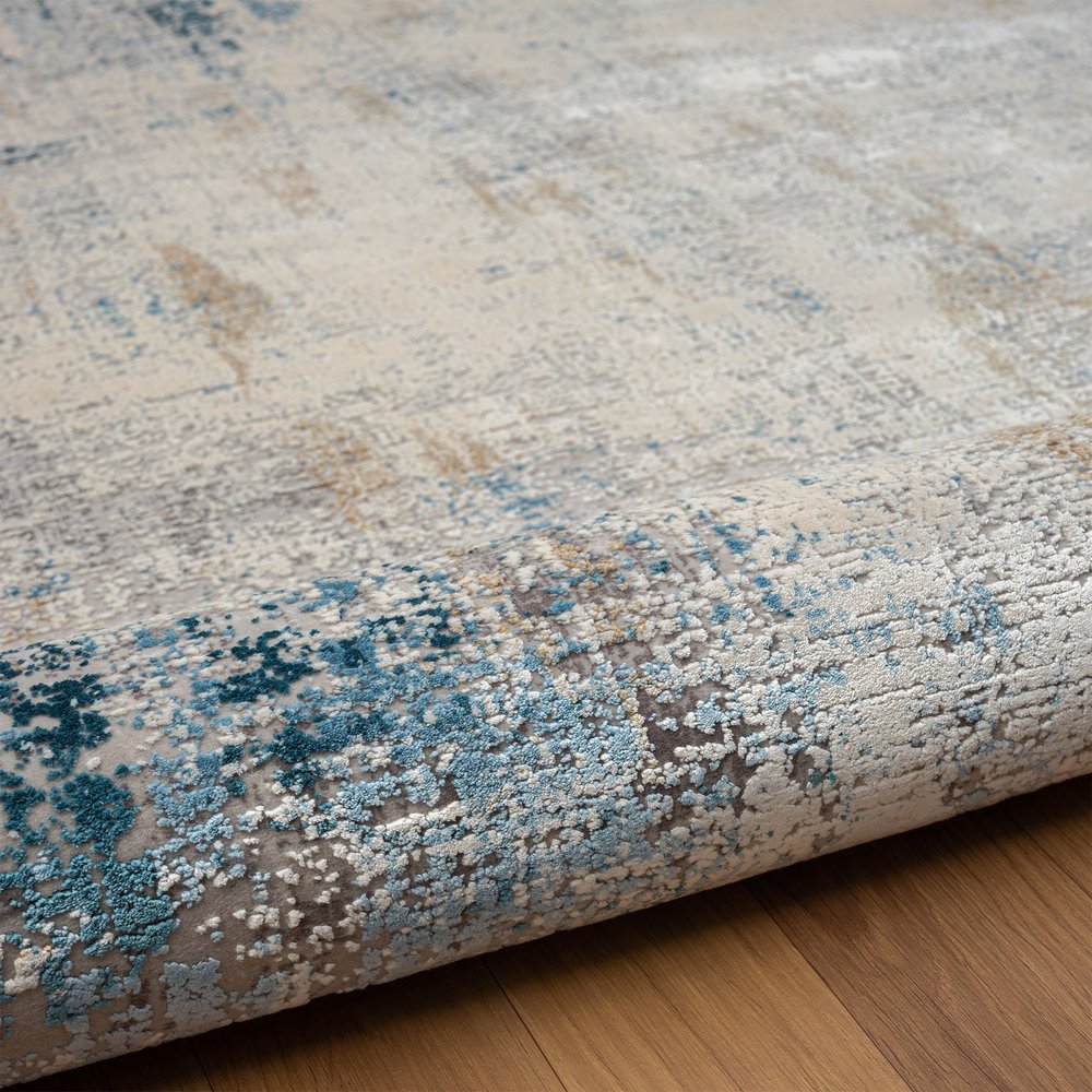 2' X 3' Blue and Ivory Abstract Area Rug