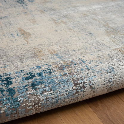 2' X 3' Blue and Ivory Abstract Area Rug