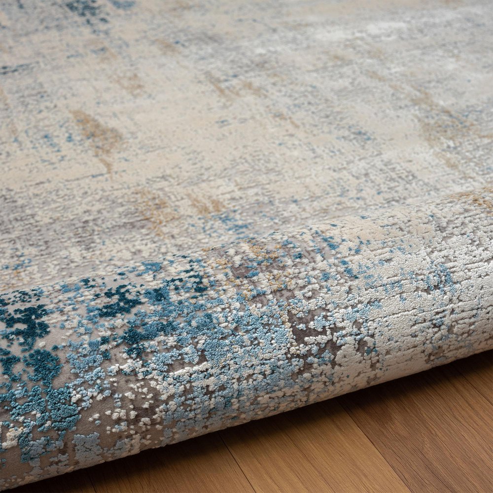 2' X 3' Blue and Ivory Abstract Area Rug