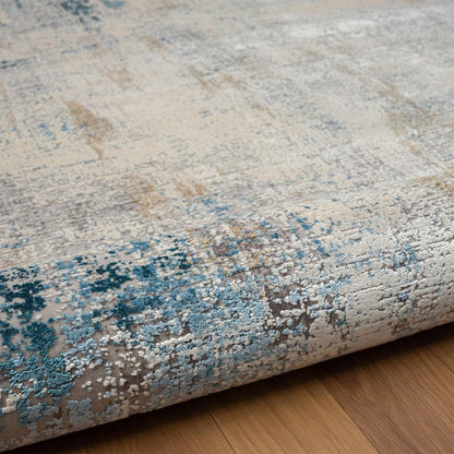 2' X 3' Blue and Ivory Abstract Area Rug