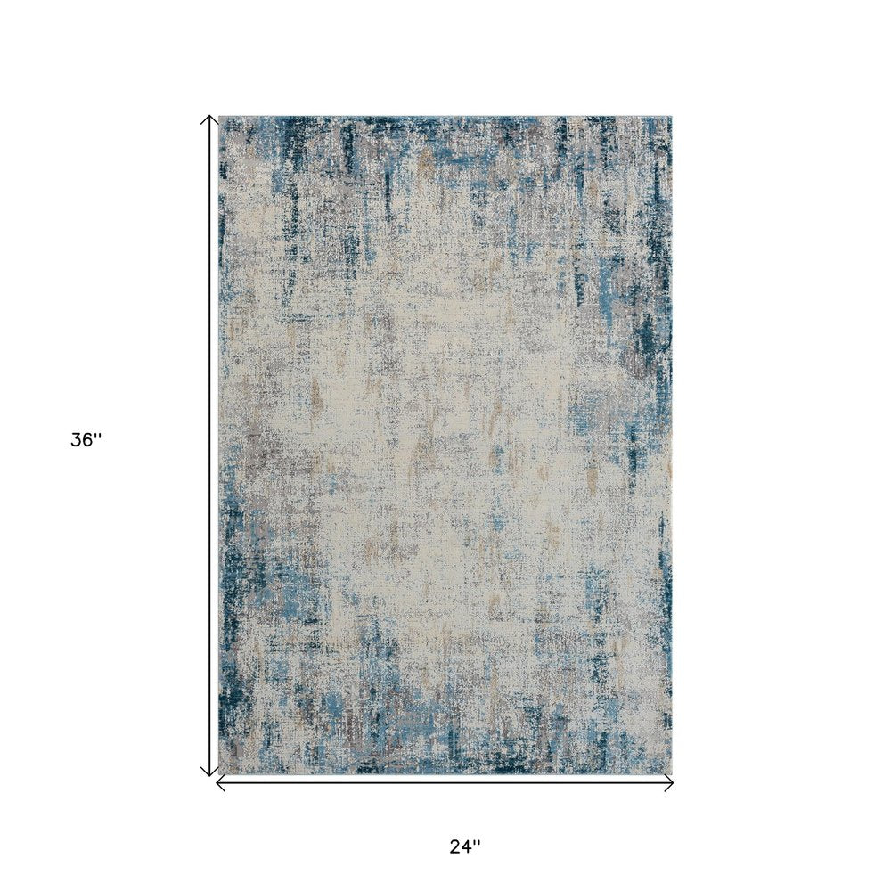 2' X 3' Blue and Ivory Abstract Area Rug