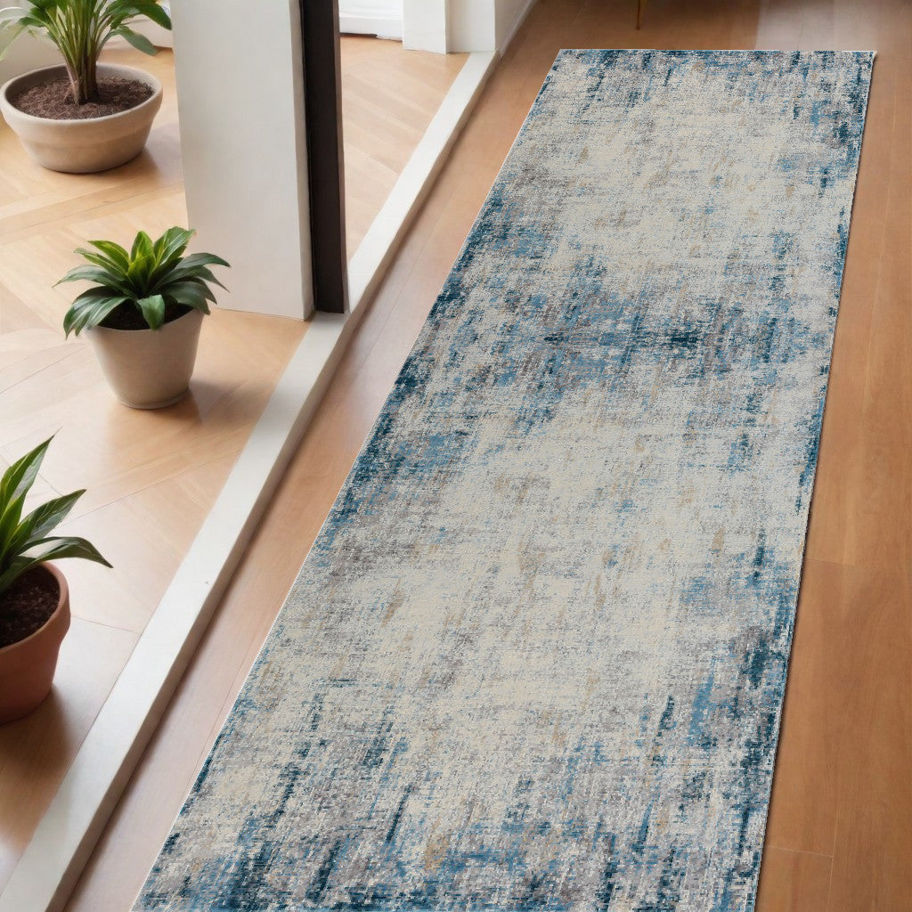 2' X 3' Blue and Ivory Abstract Area Rug