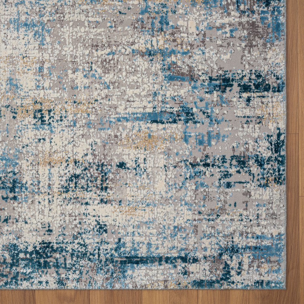 2' X 3' Blue and Ivory Abstract Area Rug