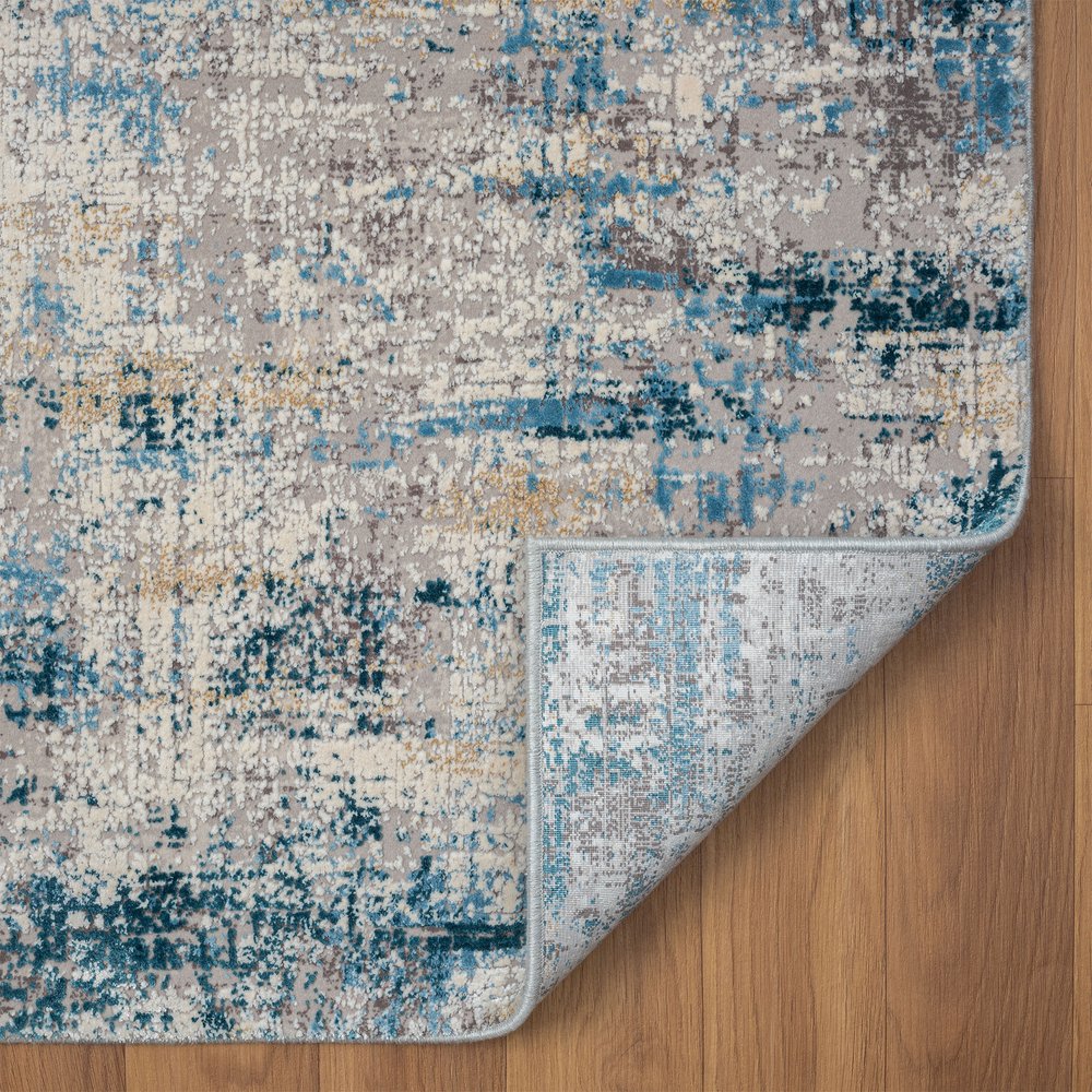 2' X 3' Blue and Ivory Abstract Area Rug