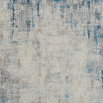 2' X 3' Blue and Ivory Abstract Area Rug