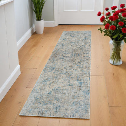 2' X 3' Blue and Ivory Abstract Area Rug