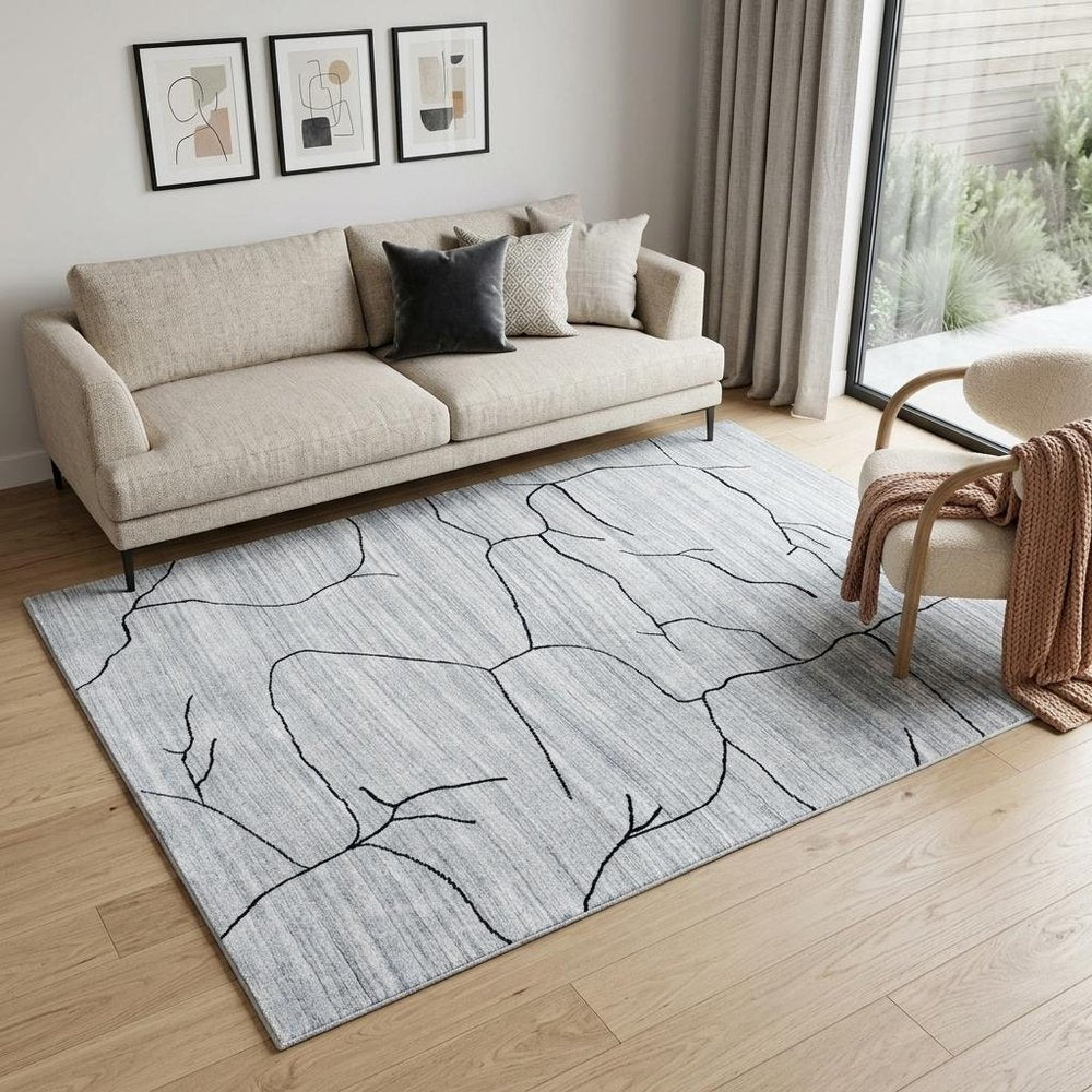5' X 8' Gray and Black Abstract Hand Loomed Area Rug
