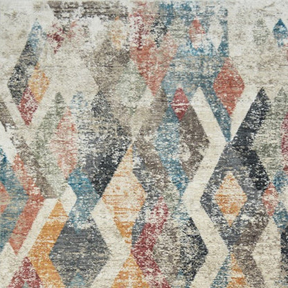 8' X 10' Beige Blue and Gray Geometric Distressed Area Rug With Fringe