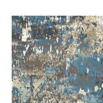 8' Beige Blue and Ivory Abstract Distressed Runner Rug With Fringe