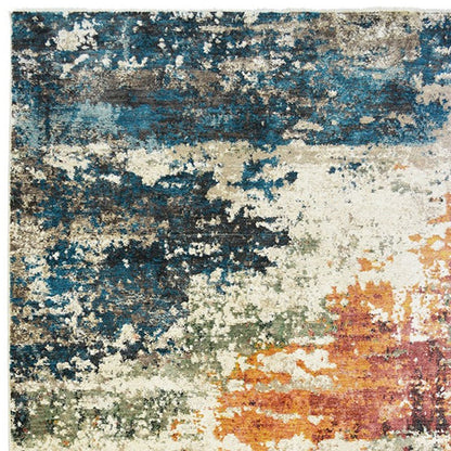8' X 10' Beige Blue and Ivory Abstract Distressed Area Rug With Fringe