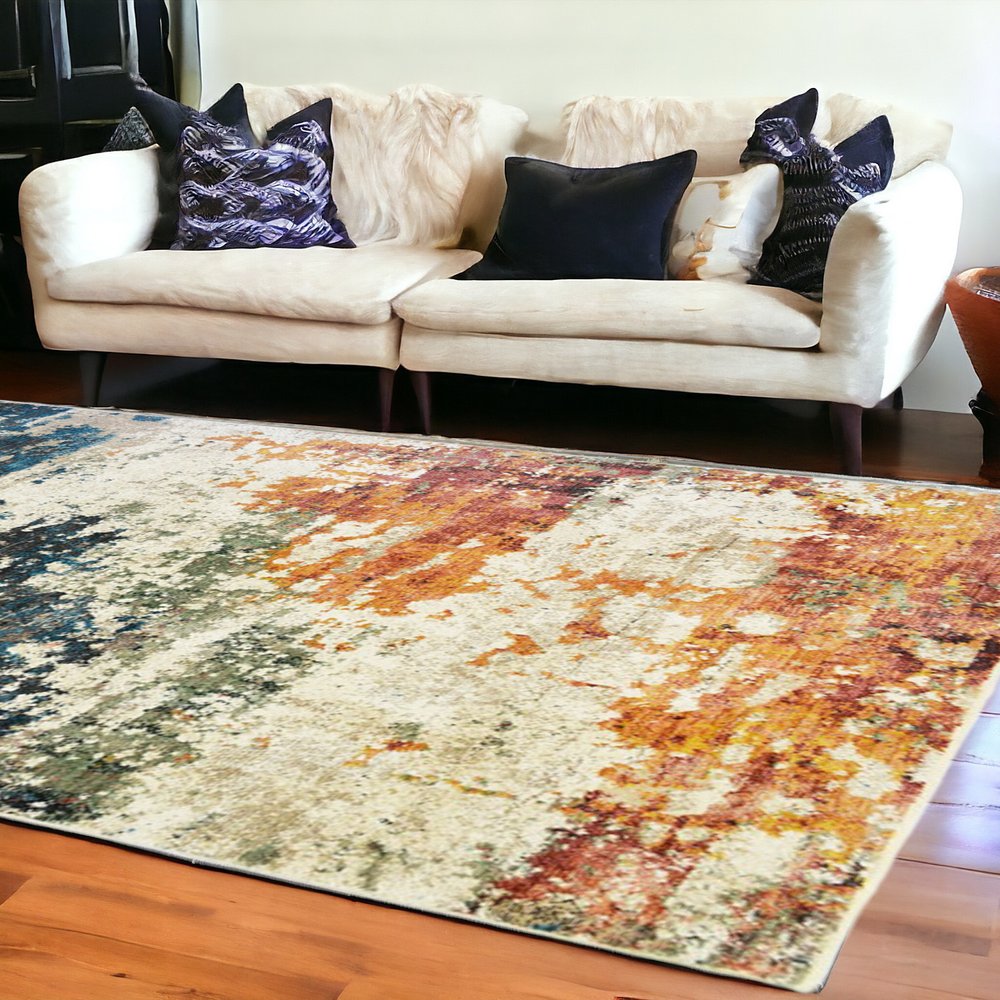 8' X 10' Beige Blue and Ivory Abstract Distressed Area Rug With Fringe