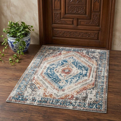 2' X 3' Teal Taupe and Rust Geometric Distressed Area Rug With Fringe