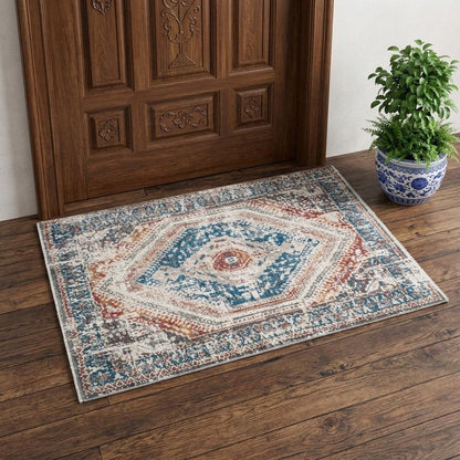 2' X 3' Teal Taupe and Rust Geometric Distressed Area Rug With Fringe