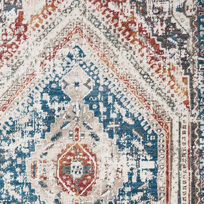 5' X 8' Teal Taupe and Rust Geometric Distressed Area Rug With Fringe