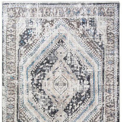 2' X 3' Gray Beige and Blue Geometric Distressed Area Rug With Fringe
